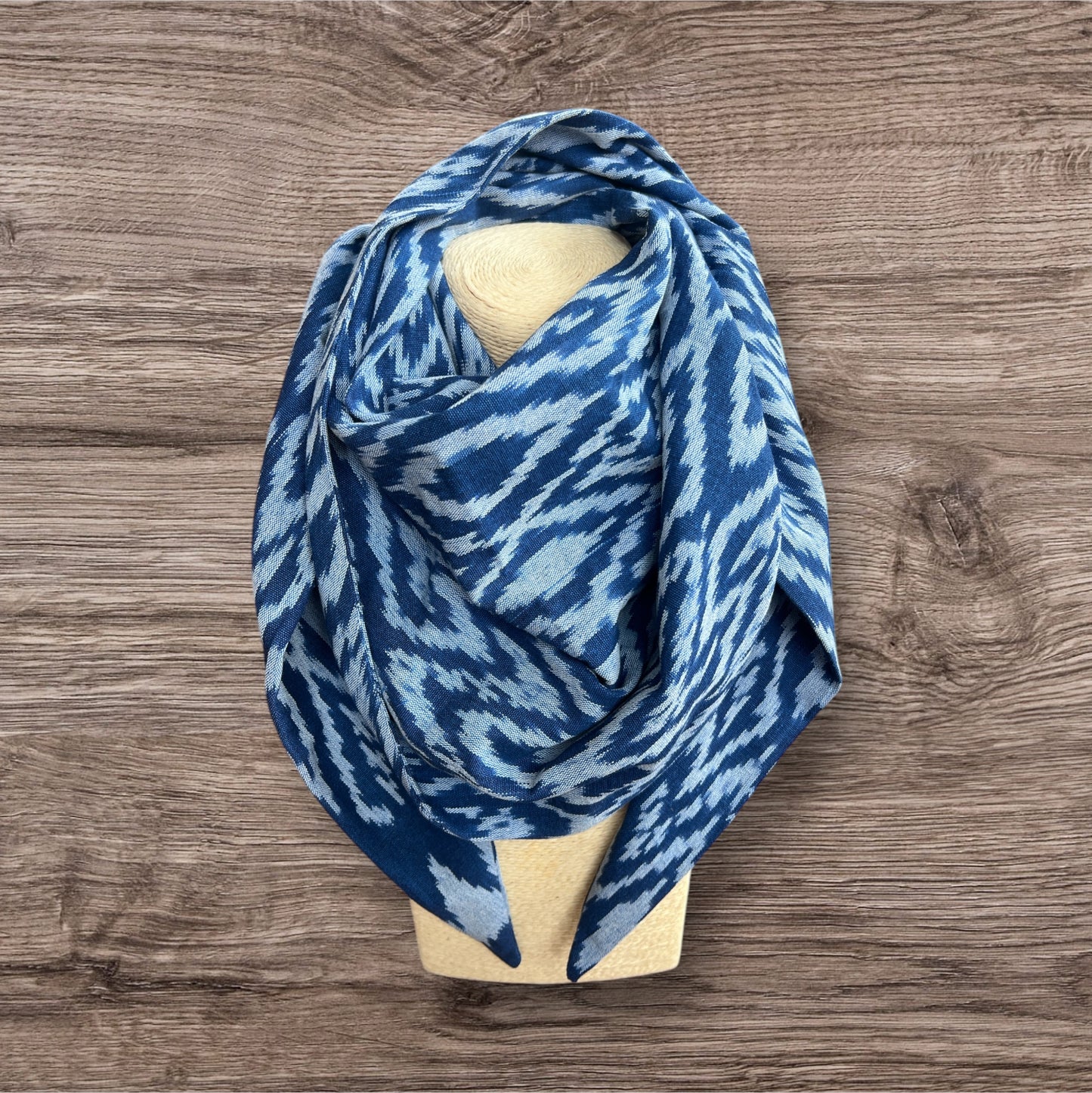 Soft Ikat scarf with a vibrant geometric pattern in shades of blue perfect for adding a boho touch to any outfit